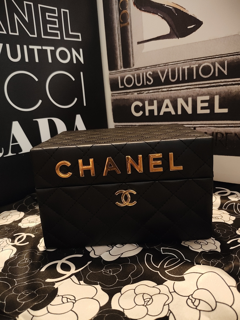 Black Quilted Jewelry Case with Gold Logo Accents And Mirror